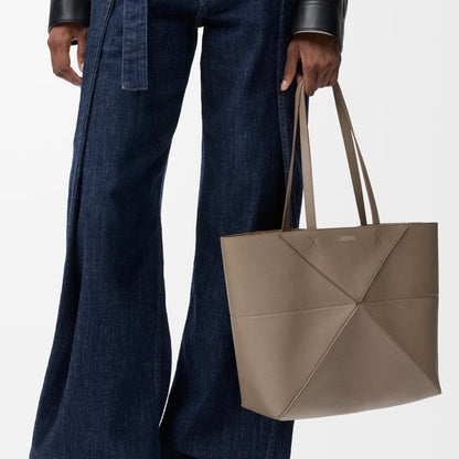 Medium horizontal Puzzle Fold tote in soft grained calfskin Taupe